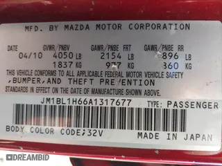 2010 Mazda Mazda3 s Sport with VIN JM1BL1H66A1317677, listed as a IAAI auction lot 42068896 with 263,272 mi miles. Bid and sale history available at carsss.com. Image 9.