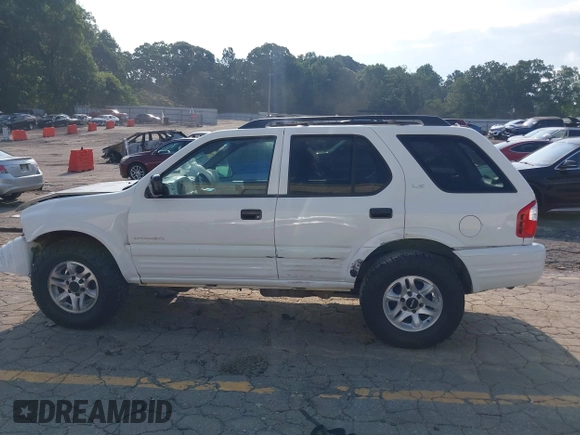 2002 Isuzu Rodeo S with VIN 4S2CK58W524321108, listed as a IAAI auction lot 42352330 with 270,614 mi miles and . Bid and sale history available at DreamBid. Image 15.