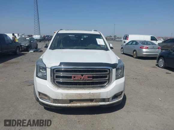 2017 GMC Yukon SLT with VIN 1GKS1BKC9HR278190, listed as a IAAI auction lot 41824213 with 104,323 mi miles. Bid and sale history available at carsss.com. Image 12.
