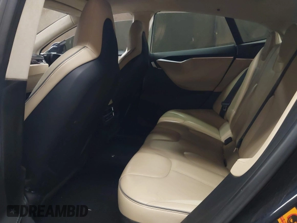 2014 Tesla Model S 60 with VIN 5YJSA1H11EFP56406, listed as a IAAI auction lot 42065157 with Not Provided miles and . Bid and sale history available at DreamBid. Image 8.