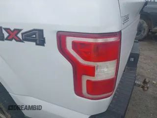 2018 Ford F-150 XL with VIN 1FTEX1EP1JKF66557, listed as a IAAI auction lot 42099567 with 126,516 mi miles and . Bid and sale history available at DreamBid. Image 21.