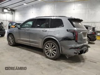 2020 Cadillac XT6 AWD Sport with VIN 1GYKPGRS5LZ145966, listed as a Copart auction lot 66585334 with 76,735 mi miles and Salvage Title. Bid and sale history available at carsss.com. Image 2.
