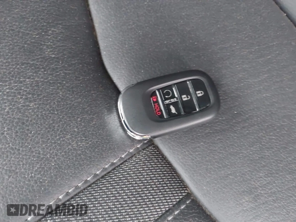2023 Honda Pilot EX-L with VIN 5FNYG1H58PB016138, listed as a IAAI auction lot 40591717 with 10,068 mi miles and . Bid and sale history available at DreamBid. Image 11.