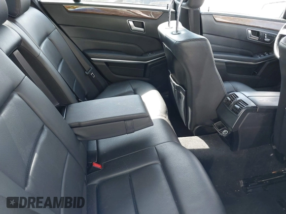 2014 Mercedes-Benz E 350 Sport with VIN WDDHF5KB4EA973595, listed as a IAAI auction lot 42125379 with 162,320 mi miles and . Bid and sale history available at DreamBid. Image 8.