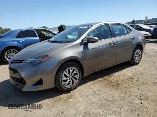 2018 Toyota Corolla L z VIN 2T1BURHE8JC097263, wystawiony jako Copart lot #57715595 z przebiegiem 78 598 mil mil oraz Szkoda całkowita • Salvage title. Historia ofert i sprzedaży dostępna na DreamBid. Obrazek 1.