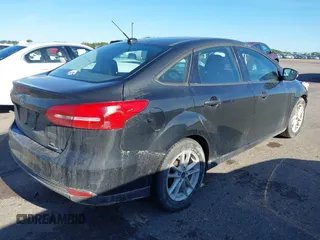 2015 Ford Focus SE with VIN 1FADP3F21FL385654, listed as a IAAI auction lot 42306171 with 187,725 mi miles and . Bid and sale history available at DreamBid. Image 4.
