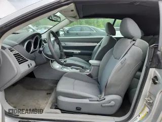 2008 Chrysler Sebring Touring z VIN 1C3LC55RX8N135160, wystawiony jako Copart lot #59419975 z przebiegiem 98 155 mil mil oraz Czysty tytuł • Clean title. Historia ofert i sprzedaży dostępna na DreamBid. Obrazek 7.