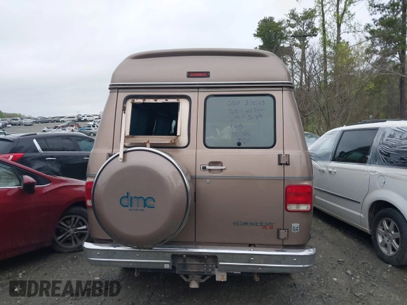 1995 Chevrolet Chevy Van z VIN 1GBEG25K8SF245639, wystawiony jako IAAI lot #41917862 z przebiegiem 89 015 mil mil oraz . Historia ofert i sprzedaży dostępna na DreamBid. Obrazek 16.