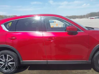2018 Mazda CX-5 Grand Touring with VIN JM3KFBDM6J0424663, listed as a IAAI auction lot 42003207 with 95,442 mi miles and . Bid and sale history available at DreamBid. Image 13.