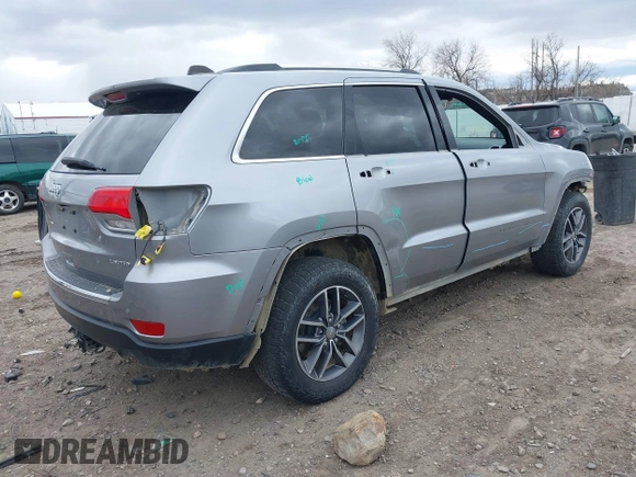 2018 Jeep Grand Cherokee Limited with VIN 1C4RJFBG5JC195417, listed as a IAAI auction lot 41861657 with 151,140 mi miles and . Bid and sale history available at DreamBid. Image 4.