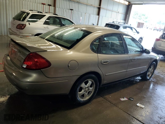 2003 Ford Taurus SES Standard with VIN 1FAFP55S23A183399, listed as a Copart auction lot 59362035 with 112,889 mi miles and Salvage title. Bid and sale history available at DreamBid. Image 3.