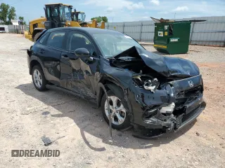 2023 Honda HR-V LX with VIN 3CZRZ2H38PM702334, listed as a Copart auction lot 60760625 with 53,149 mi miles and Salvage title. Bid and sale history available at DreamBid. Image 4.