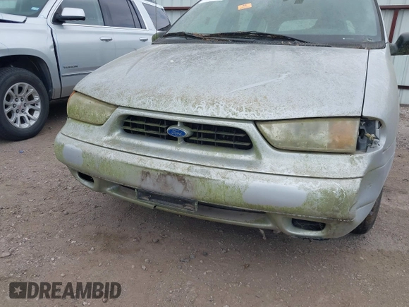 1998 Ford Windstar z VIN 2FMDA51U2WBA75203, wystawiony jako IAAI lot #41904423 z przebiegiem 132 388 mil mil oraz . Historia ofert i sprzedaży dostępna na DreamBid. Obrazek 6.