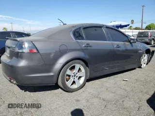 2009 Pontiac G8 GT with VIN 6G2EC57Y19L215718, listed as a Copart auction lot 77231714 with 57,515 mi miles and Salvage Title. Bid and sale history available at carsss.com. Image 3.