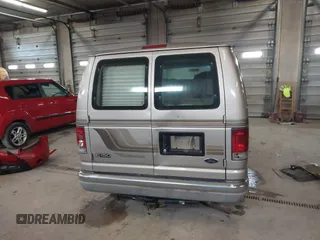 2002 Ford Econoline Cargo Recreational with VIN 1FDRE14L22HB53224, listed as a IAAI auction lot 41967017 with 202,065 mi miles. Bid and sale history available at carsss.com. Image 16.