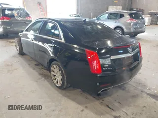 2014 Cadillac CTS Luxury AWD with VIN 1G6AX5S31E0143179, listed as a IAAI auction lot 41421639 with 135,810 mi miles and . Bid and sale history available at DreamBid. Image 3.