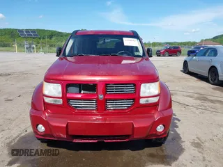2010 Dodge Nitro Heat z VIN 1D4PU4GK5AW174777, wystawiony jako IAAI lot #42290362 z przebiegiem 165 537 mil mil oraz . Historia ofert i sprzedaży dostępna na DreamBid. Obrazek 12.