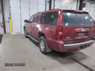 2013 Chevrolet Suburban LT with VIN 1GNSKJE76DR222890, listed as a IAAI auction lot 41698835 with 288,835 mi miles. Bid and sale history available at carsss.com. Image 3.