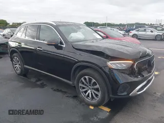 2023 Mercedes-Benz GLC 300 with VIN W1NKM4GB8PF047045, listed as a IAAI auction lot 42242558 with 11,983 mi miles and . Bid and sale history available at DreamBid. Image 1.