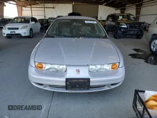 2000 Saturn SL with VIN 1G8ZK5275YZ269895, listed as a Copart auction lot 63102485 with Not provided miles and Clean title. Bid and sale history available at DreamBid. Image 5.
