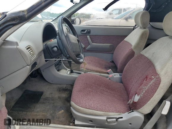 1993 Geo Metro z VIN JG1MR3362PK209644, wystawiony jako Copart lot #58749655 z przebiegiem 149 163 mil mil oraz Szkoda całkowita • Salvage title. Historia ofert i sprzedaży dostępna na DreamBid. Obrazek 7.