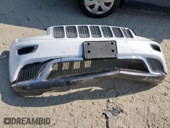 2014 Jeep Grand Cherokee Summit with VIN 1C4RJFJG9EC474781, listed as a Copart auction lot 60720325 with 64,546 mi miles and Salvage title. Bid and sale history available at DreamBid. Image 13.