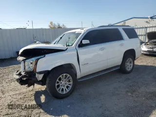 2015 GMC Yukon SLE with VIN 1GKS2AKCXFR107517, listed as a Copart auction lot 76950354 with Not Provided miles and Salvage Title. Bid and sale history available at carsss.com. Image 1.