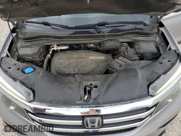 2017 Honda Pilot Touring z VIN 5FNYF6H92HB006855, wystawiony jako Copart lot #53650655 z przebiegiem 130 732 mil mil oraz Szkoda całkowita • Salvage title. Historia ofert i sprzedaży dostępna na DreamBid. Obrazek 12.