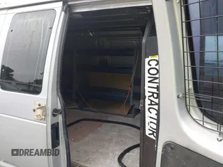 2009 Ford Econoline Cargo Commercial z VIN 1FTNE14W29DA56023, wystawiony jako IAAI lot #42362663 z przebiegiem 211 326 mil mil oraz . Historia ofert i sprzedaży dostępna na DreamBid. Obrazek 8.