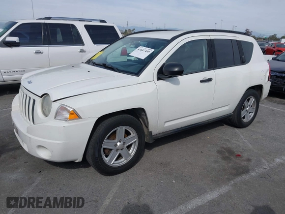 2007 Jeep Compass Sport with VIN 1J8FT47W77D145745, listed as a IAAI auction lot 41687495 with 218,231 mi miles. Bid and sale history available at carsss.com. Image 2.