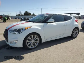 2013 Hyundai Veloster w/Gray Int z VIN KMHTC6ADXDU127194, wystawiony jako Copart lot #51751345 z przebiegiem 122 221 mil mil oraz Szkoda całkowita • Salvage title. Historia ofert i sprzedaży dostępna na DreamBid. Obrazek 1.