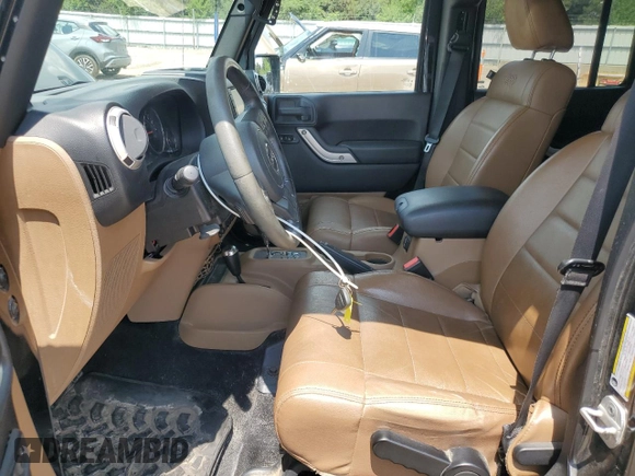 2012 Jeep Wrangler Unlimited Sahara z VIN 1C4HJWEG6CL141988, wystawiony jako Copart lot #61631115 z przebiegiem 140 401 mil mil oraz Szkoda całkowita • Salvage title. Historia ofert i sprzedaży dostępna na DreamBid. Obrazek 7.