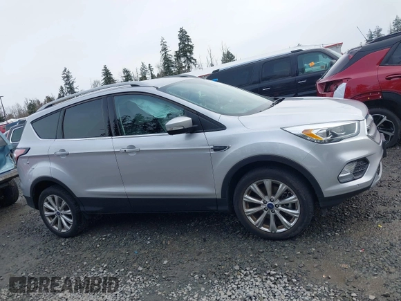 2017 Ford Escape Titanium with VIN 1FMCU9J97HUE98023, listed as a IAAI auction lot 41745843 with 24,857 mi miles. Bid and sale history available at carsss.com. Image 12.