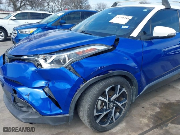 2019 Toyota C-HR XLE with VIN NMTKHMBX8KR079399, listed as a IAAI auction lot 41701134 with 71,892 mi miles. Bid and sale history available at carsss.com. Image 17.