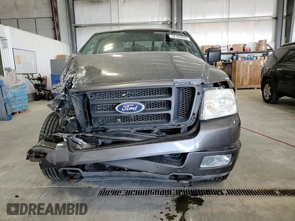 2004 Ford F-150 XL with VIN 1FTRF14W44NA07441, listed as a Copart auction lot 52163935 with 94,640 mi miles and Salvage Title. Bid and sale history available at DreamBid. Image 11.