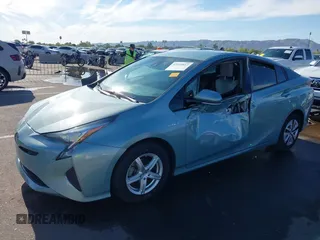 2018 Toyota Prius Two with VIN JTDKBRFUXJ3066430, listed as a IAAI auction lot 42034812 with 119,711 mi miles and . Bid and sale history available at carsss.com. Image 17.