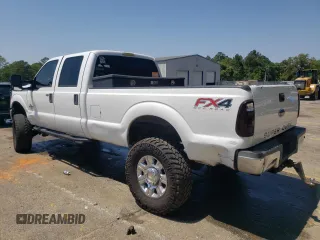 2014 Ford F-350 XLT with VIN 1FT8W3BT9EEA72092, listed as a Copart auction lot 53665775 with 298,659 mi miles and Salvage Title. Bid and sale history available at DreamBid. Image 2.