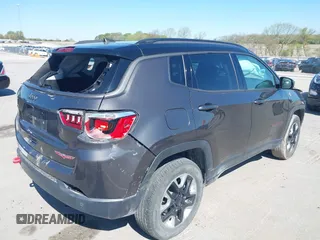 2019 Jeep Compass Trailhawk with VIN 3C4NJDDB0KT619337, listed as a IAAI auction lot 42171160 with 63,869 mi miles and . Bid and sale history available at DreamBid. Image 4.