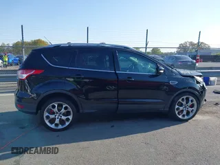 2013 Ford Escape Titanium с VIN 1FMCU9J90DUC40758, выставлен на аукционе IAAI как лот 41927827 с пробегом 110 614 миль миль и . История ставок и продаж доступна на DreamBid. Изображение 13.