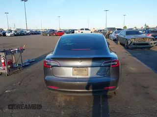 2021 Tesla Model 3 Long Range with VIN 5YJ3E1EBXMF995814, listed as a IAAI auction lot 41838453 with 51,415 mi miles. Bid and sale history available at carsss.com. Image 17.