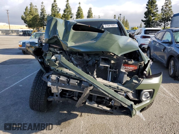 2021 Toyota Tacoma SR5 z VIN 3TMAZ5CN6MM157145, wystawiony jako Copart lot #51641085 z przebiegiem Nie podano mil oraz Szkoda całkowita • Salvage title. Historia ofert i sprzedaży dostępna na DreamBid. Obrazek 5.