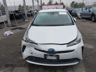 2021 Toyota Prius L Eco with VIN JTDKAMFU6M3150707, listed as a IAAI auction lot 41867272 with 55,499 mi miles and . Bid and sale history available at DreamBid. Image 13.
