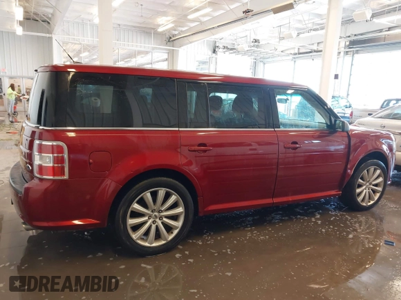 2014 Ford Flex SEL z VIN 2FMGK5C80EBD19715, wystawiony jako IAAI lot #41305306 z przebiegiem 204 042 mil mil oraz . Historia ofert i sprzedaży dostępna na DreamBid. Obrazek 13.