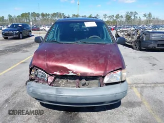 1999 Toyota Sienna LE with VIN 4T3ZF13C1XU112717, listed as a IAAI auction lot 41725827 with 272,639 mi miles. Bid and sale history available at carsss.com. Image 12.