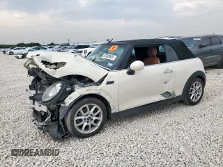 2017 MINI Convertible Cooper with VIN WMWWG5C32H3C20341, listed as a Copart auction lot 57039685 with 100,575 mi miles and Salvage title. Bid and sale history available at DreamBid. Image 1.