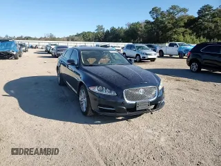 2013 Jaguar XJ with VIN SAJWA2G16DLV50973, listed as a Copart auction lot 82555074 with 148,956 mi miles and Salvage Title. Bid and sale history available at carsss.com. Image 11.