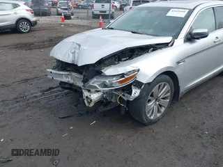 2011 Ford Taurus Limited with VIN 1FAHP2FW0BG185270, listed as a IAAI auction lot 41669460 with 173,484 mi miles and . Bid and sale history available at carsss.com. Image 6.