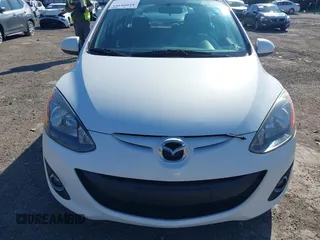 2013 Mazda 2 Touring z VIN JM1DE1LYXD0157874, wystawiony jako IAAI lot #41999395 z przebiegiem 136 954 mil mil oraz . Historia ofert i sprzedaży dostępna na DreamBid. Obrazek 12.