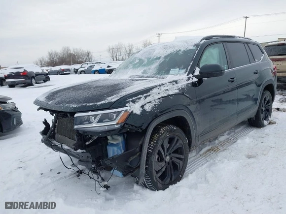 2021 Volkswagen Atlas 3.6L V6 SE w/Technology with VIN 1V2KR2CA4MC608976, listed as a IAAI auction lot 41018789 with 35,411 mi miles. Bid and sale history available at carsss.com. Image 2.