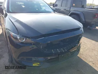 2019 Mazda CX-5 Touring with VIN JM3KFACM6K0533203, listed as a IAAI auction lot 41973125 with 106,882 mi miles and . Bid and sale history available at carsss.com. Image 6.